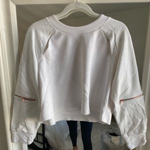 Cropped white athletic sweater